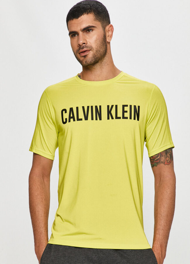 Calvin Klein Performance - T-shirt żółto - zielony 00GMF0K150