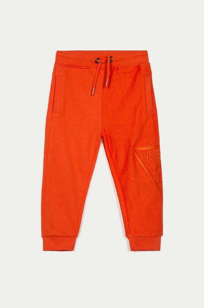 Guess - Spodnie dziecięce 92-122 cm pomarańczowy N1RQ09.KA6R0