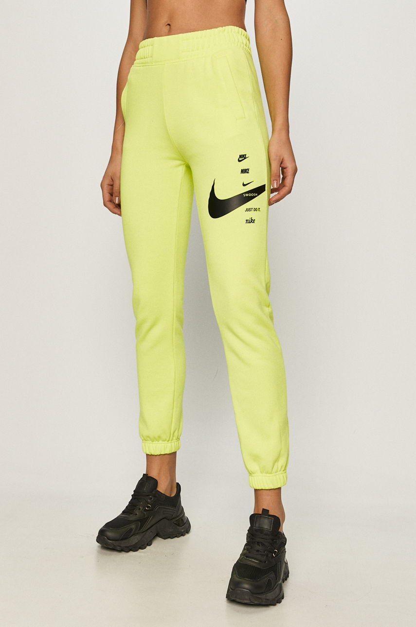 Nike Sportswear - Spodnie żółto - zielony CU5631