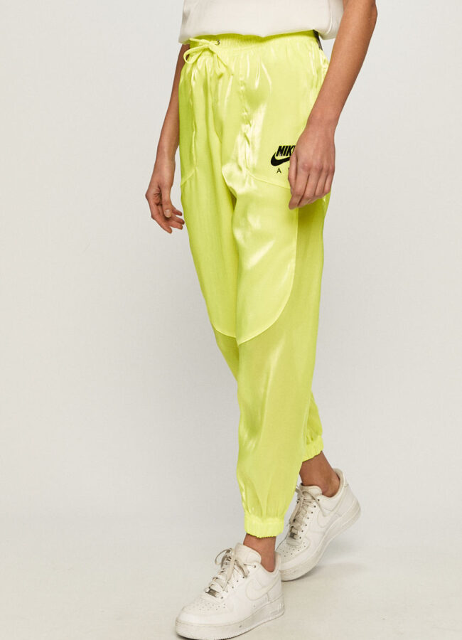Nike Sportswear - Spodnie żółto - zielony CU6566